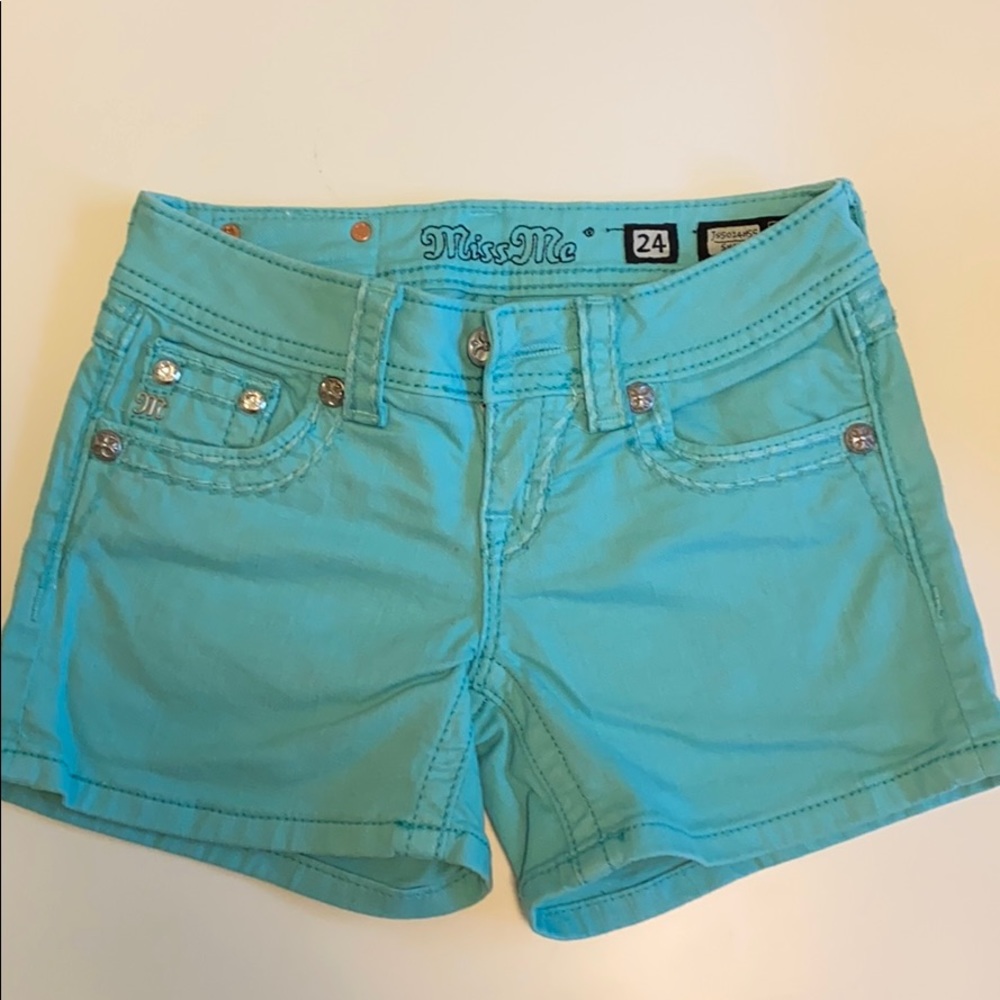 Teal jean shorts